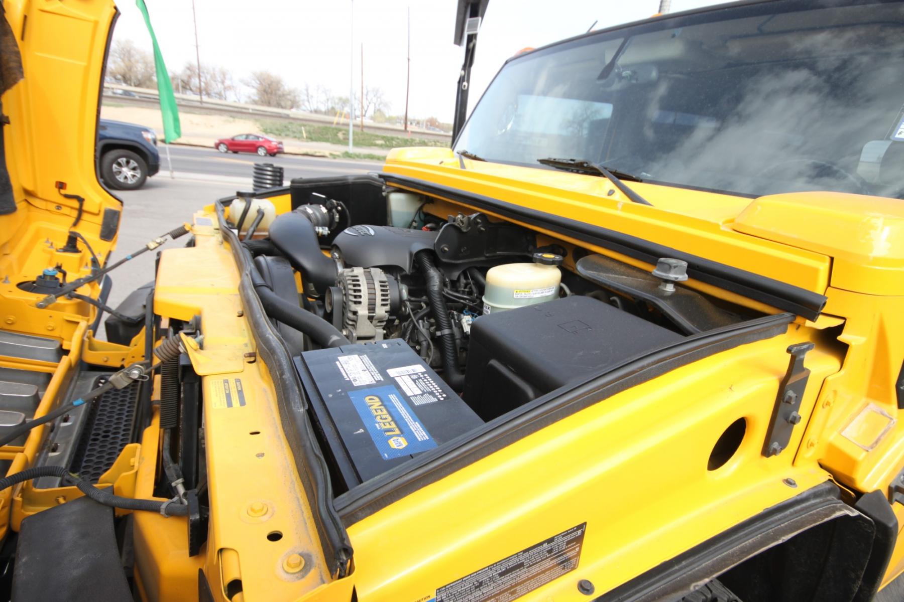 2003 Yellow /Gray Hummer H2 H2 (5GRGN23U73H) with an 6.0 Gasoline V8 engine, 4 speed automatic transmission, located at 4562 State Avenue, Billings, MT, 59101, (406) 896-9833, 45.769516, -108.526772 - 2003 Hummer H2 Sport Utility - Leather & Sunroof! 6.0 gasoline V8 engine - 4 speed heavy duty automatic transmission - 4WD - 106,898 miles Dual zone climate control - air conditioning - tilt steering wheel - cruise control - touchscreen audio (faceplate pulled at time of pictures) - power win - Photo #9